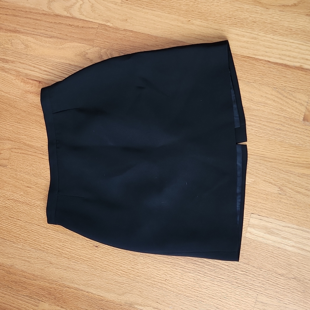 Bebe size 6 black suit skirt, fully lined, w/slit